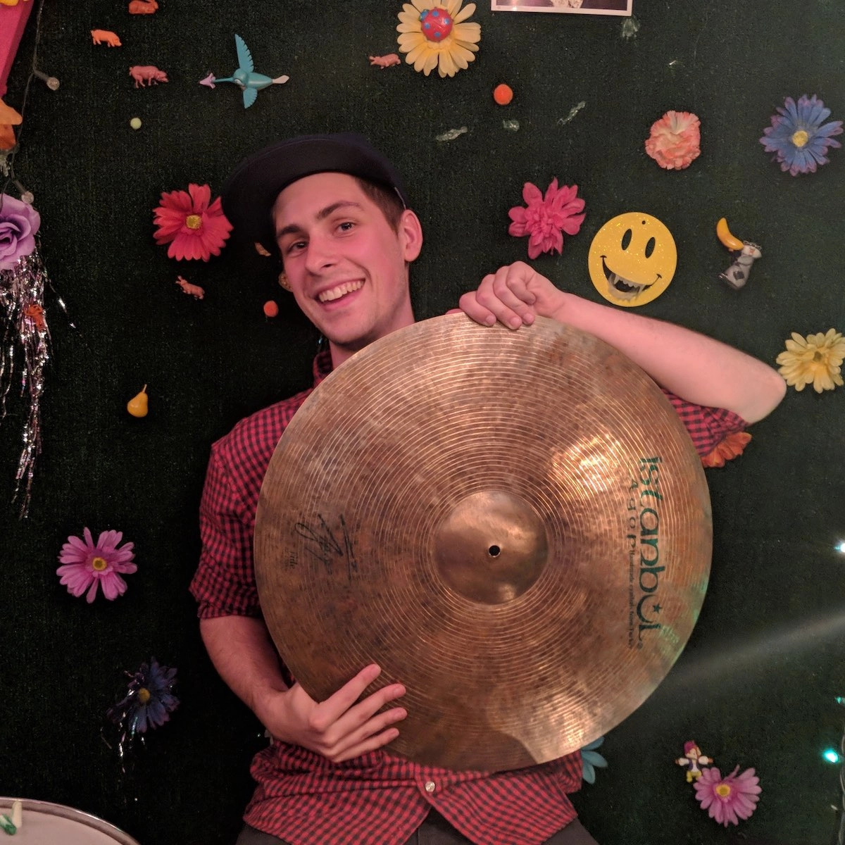 mason holding a cymbal at werewolf vacation